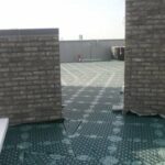 Installing the attenuation system on a blue roof system