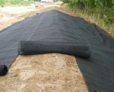Erosamat easily installed over prepared surface with minimum disrupution and pinned into place. The Turf Reinfocement Mat is placed over the crest of embankments where overtopping is possible
