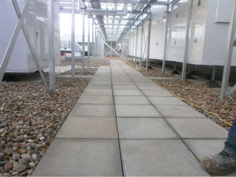 Paved walkway for plant maintenance access 